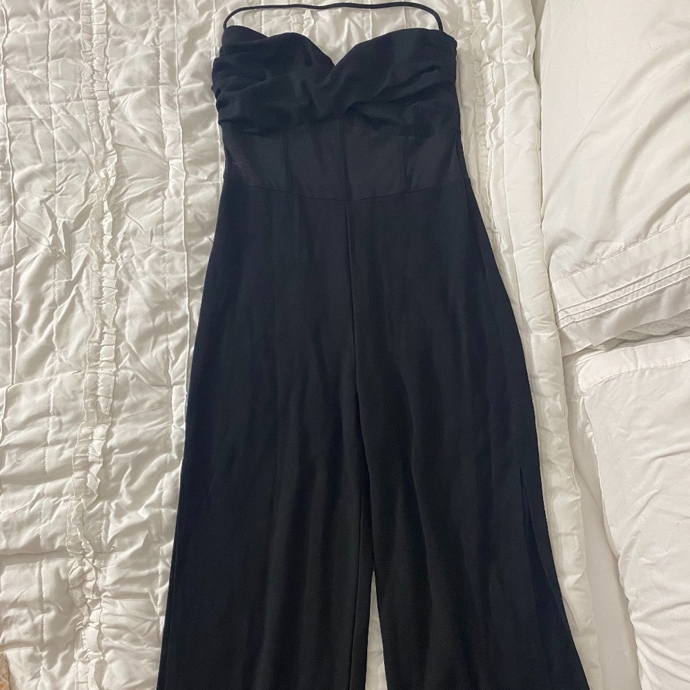 Black jumpsuit with slits and corset top